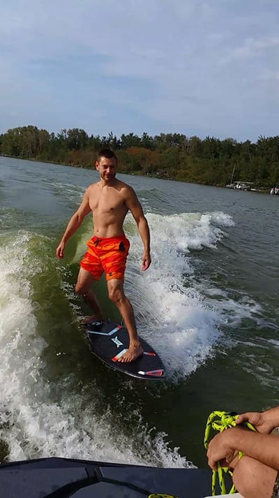 Sean surfing
